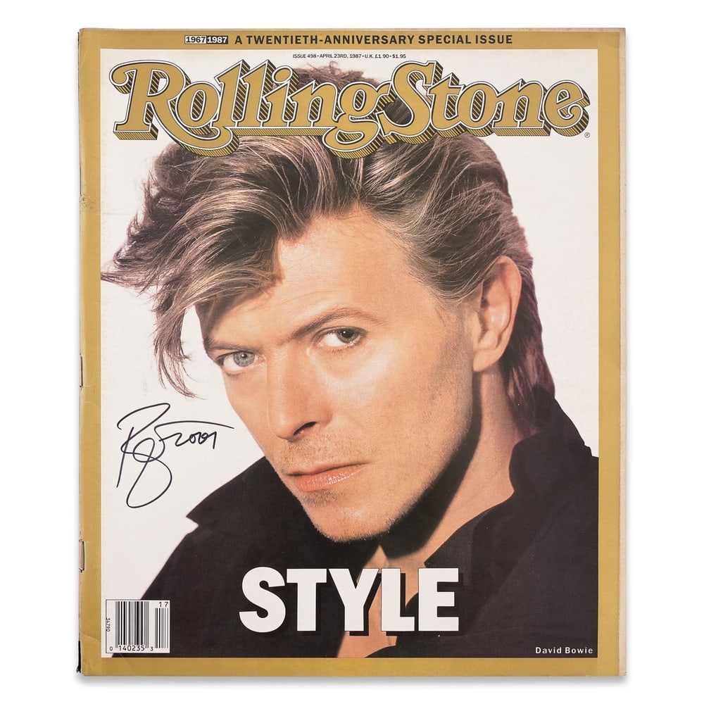 DAVID BOWIE SIGNED "ROLLING STONE" MAGAZINE: 12 x 9 7/8 in (30.5 x 25 cm) Provenance and Authentication: According to the Letter of Authenticity (LOA) and Certificate of Authenticity (COA) provided by the consignor, this collectible was