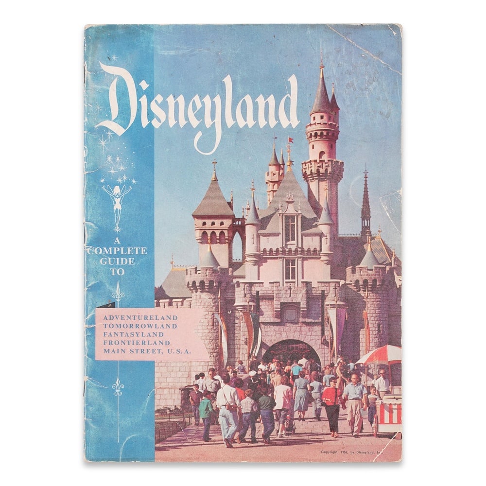 WALT DISNEY SIGNED "1956 DISNEYLAND SOUVENIR PROGRAM": 11 1/2 x 8 1/4 in (29.2 x 21 cm) Provenance and Authentication: According to the Letter of Authenticity (LOA) and Certificate of Authenticity (COA) provided by the consignor, this collectible was