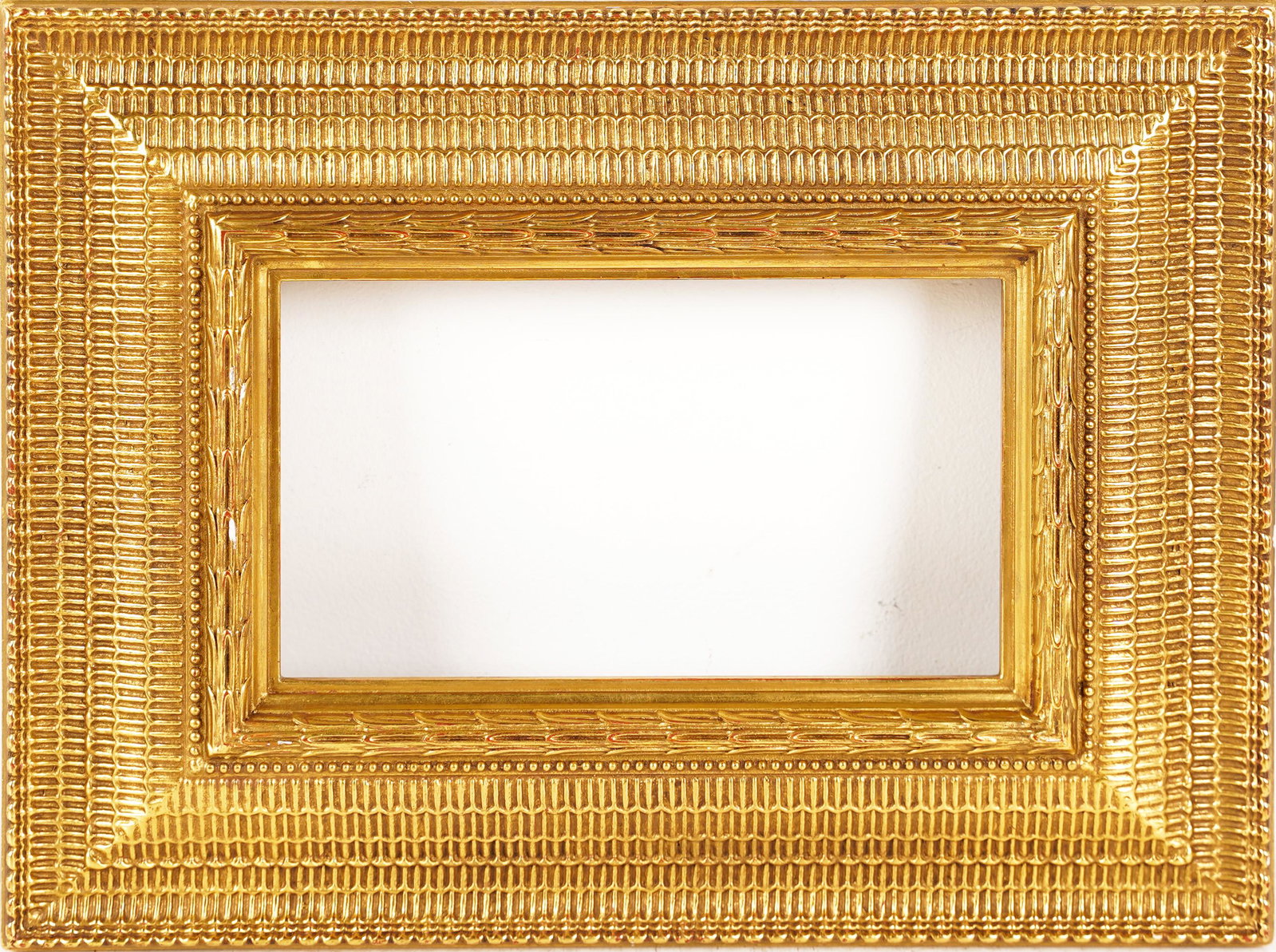 Stanford White Style American Impressionist Frame: A nice gold gilded Stanford White style replica style frame. Standard early American Impressionist size.Rabbit size 5 1/2 x 9 1/4. Sight size 4 7/8 x 8 5/8. Overall size 11 1/2 x 15 1/2.