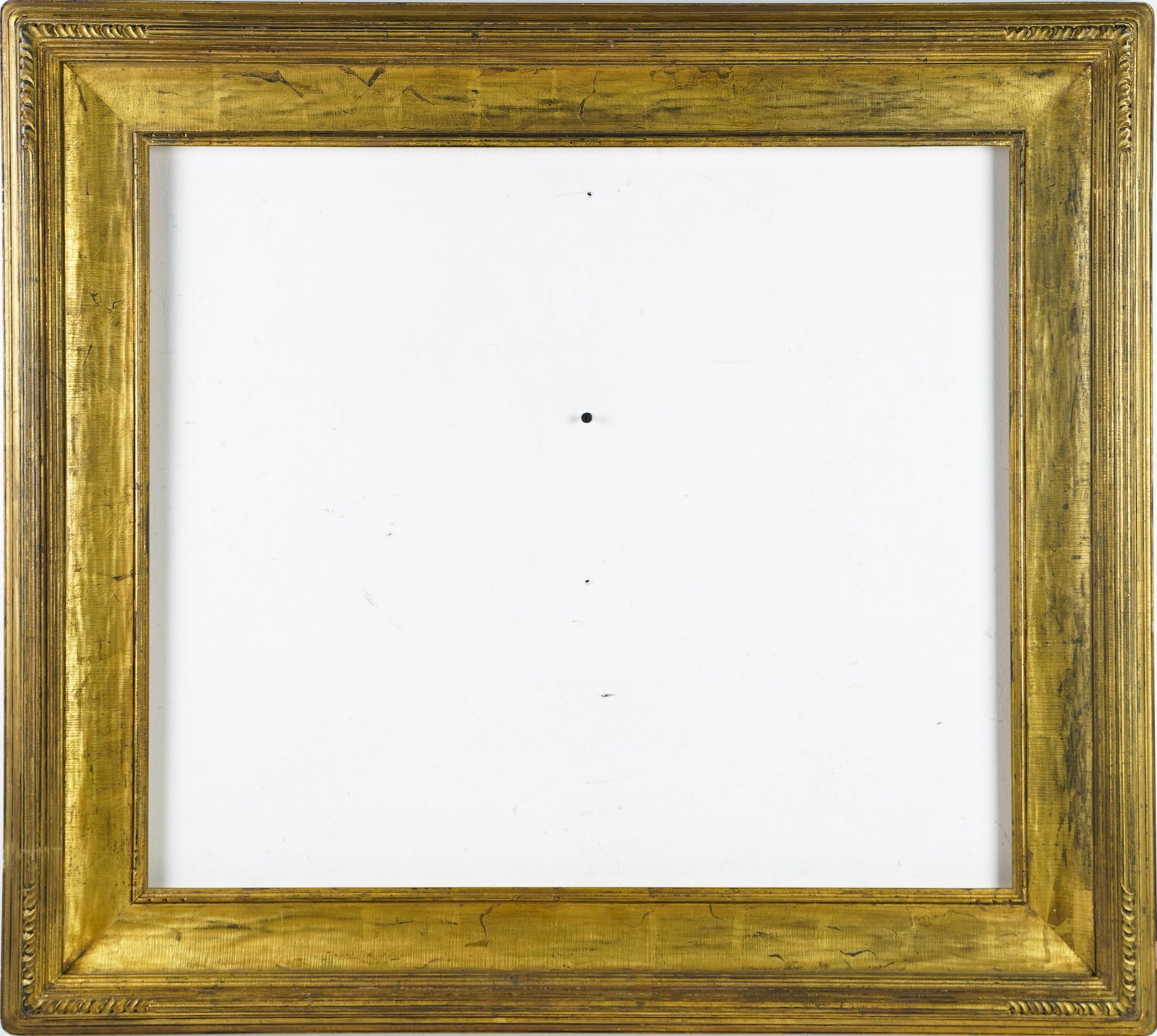 Gilded American Arts and Crafts Impressionist Frame: Classic hand carved and gilded American Impressionist frame. Sight size 24 1/4 x 28 1/2 inches. Painting size 25 3/16 x 30 1/8 inches. Overall 34 x 38 inches.