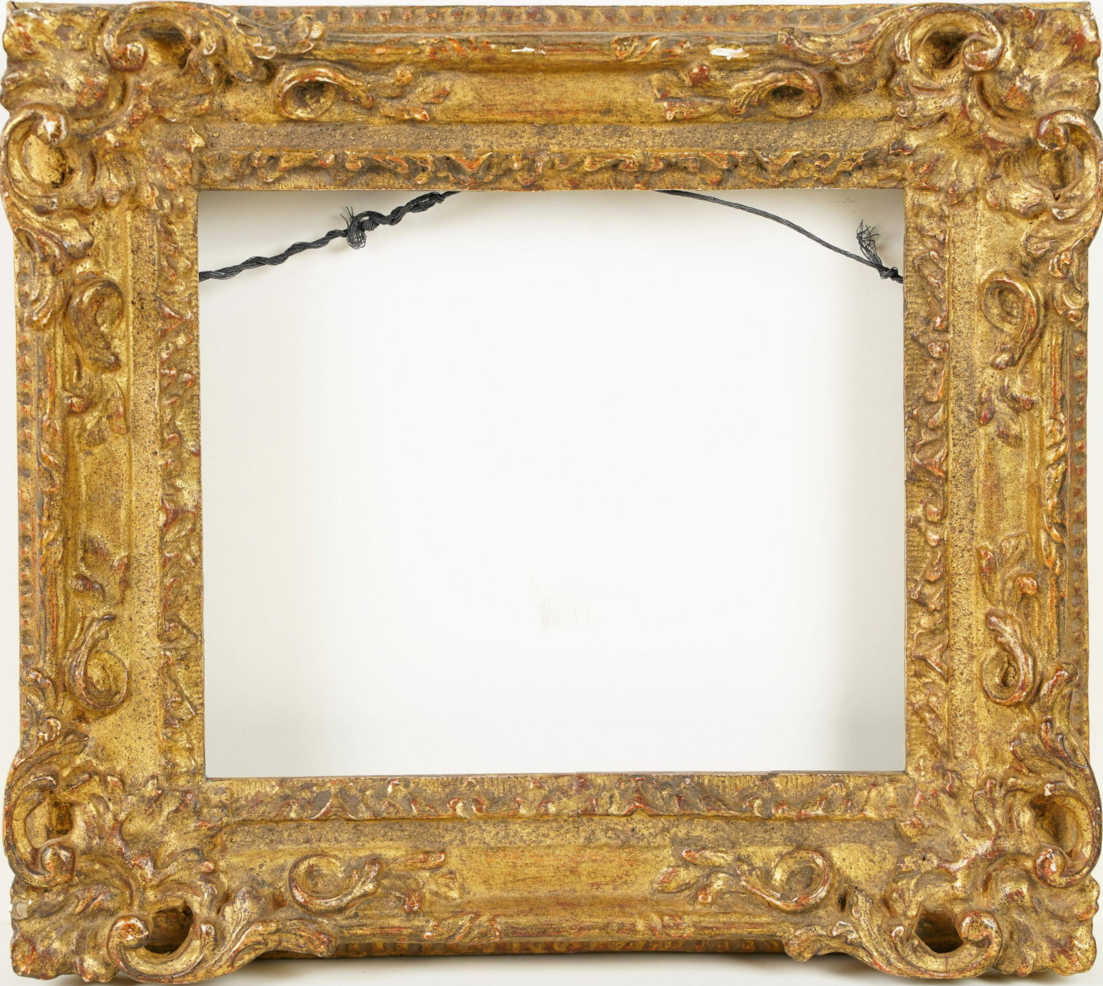Carved and Gilded Museum Impressionist Frame: Gallery / museum hand and carved and gold gilt small American or European Impressionist style frame. Sight size 7 x 8 1/2 inches. Painting size 7 3/4 x 9 1/4 inches. 12 x13 inches.
