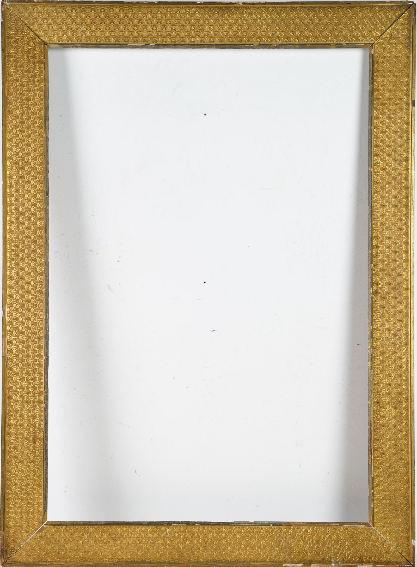 Antique American Aesthetic Movement Cassetta Frame: Elegant late 19th or early 20th century American gilded flat panel cassetta frame have an overlapping scale pattern. Sight size 23 1/2 x 35 1/2 inches. Painting size 24 1/4 x 36 1/4 inches. Overall 30