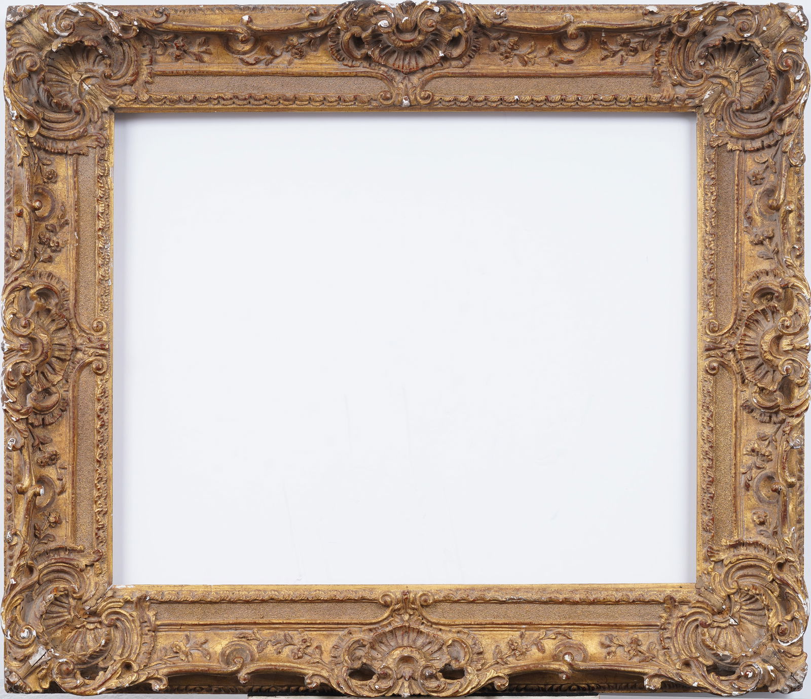 Vintage American or European Giltwood Impressionist Oil Painting Frame: Vintage American or European fancy giltwood oil painting frame. Sizes are written verso, 34 x 41 overall, 24 x 29.5 rabbet and 23 x 28.5 then sight size. Please see all images for condition. Size is m