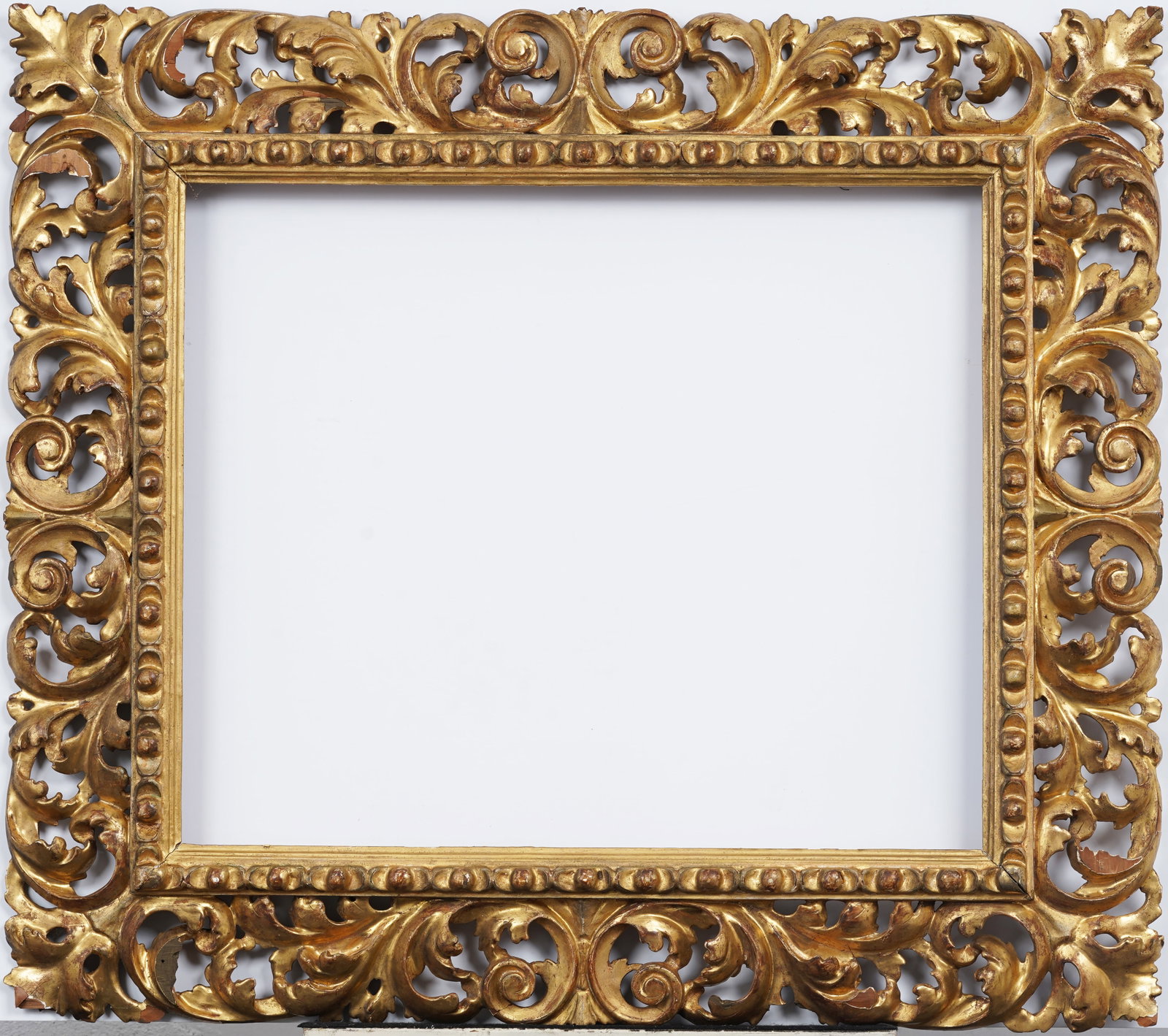 Antique European Fancy Giltwood Oil Painting Frame: Antique European oil painting frame. The sizes are written verso. The first size is the overall, then rabbet and finally sight size. Please see all images for condition. Size is measured and written o