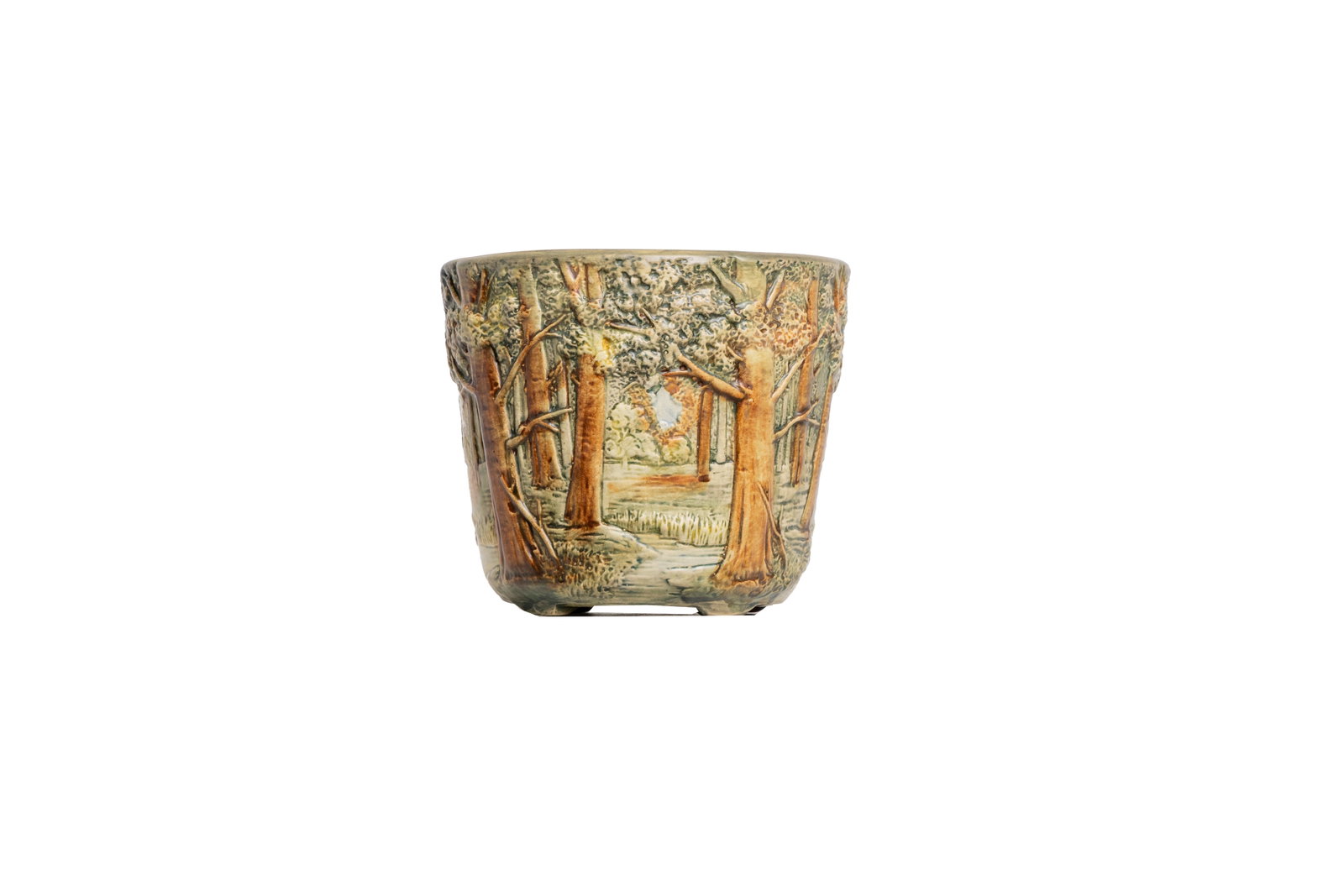 Vintage Welker Pottery Embossed Ceramic Woodland Planter: Relief-molded woodland scene planter with vibrant glaze. Approx. 7.75" tall and 8.75" top diameter.Size is measured and written on the back of the painting or next to each object. The first size is th