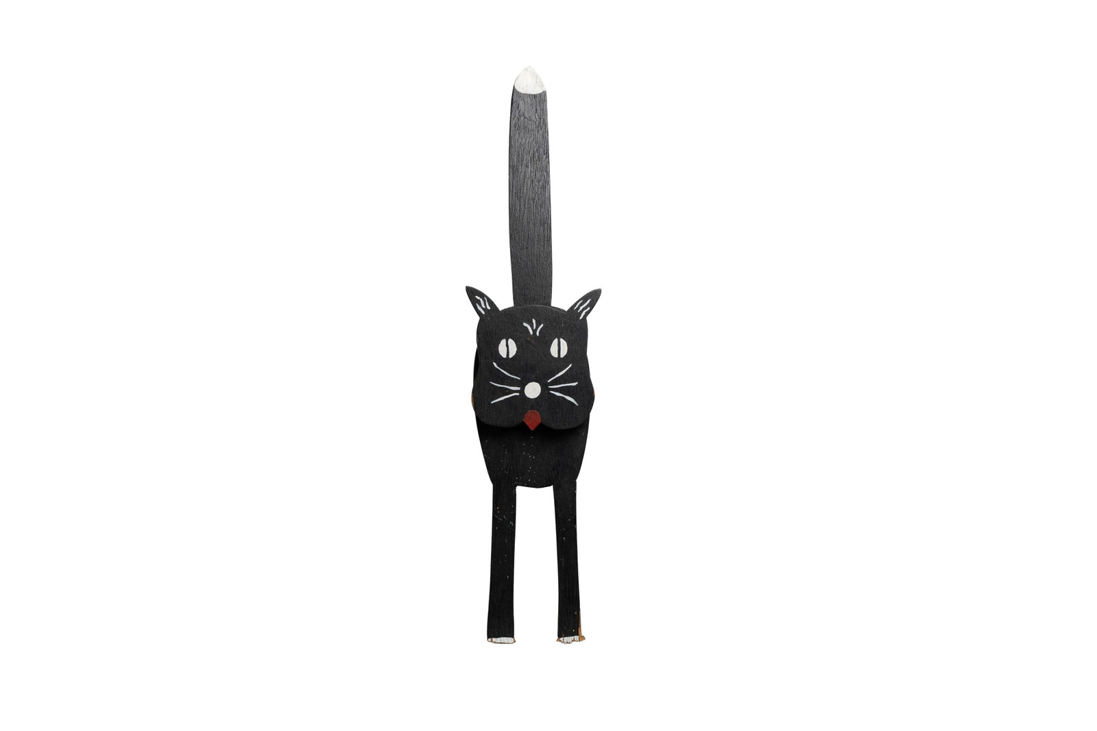 Folk Art Black Cat Cutout: Charming painted wooden black cat with exaggerated tall tail and graphic white details. Wall-mount folk art with great silhouette and age. Measuring: 21" tall x 5" wide x 1.5" deep. Size is measured a