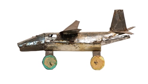 Handmade Tin Folk Art Jet Plane with Painted Wheels