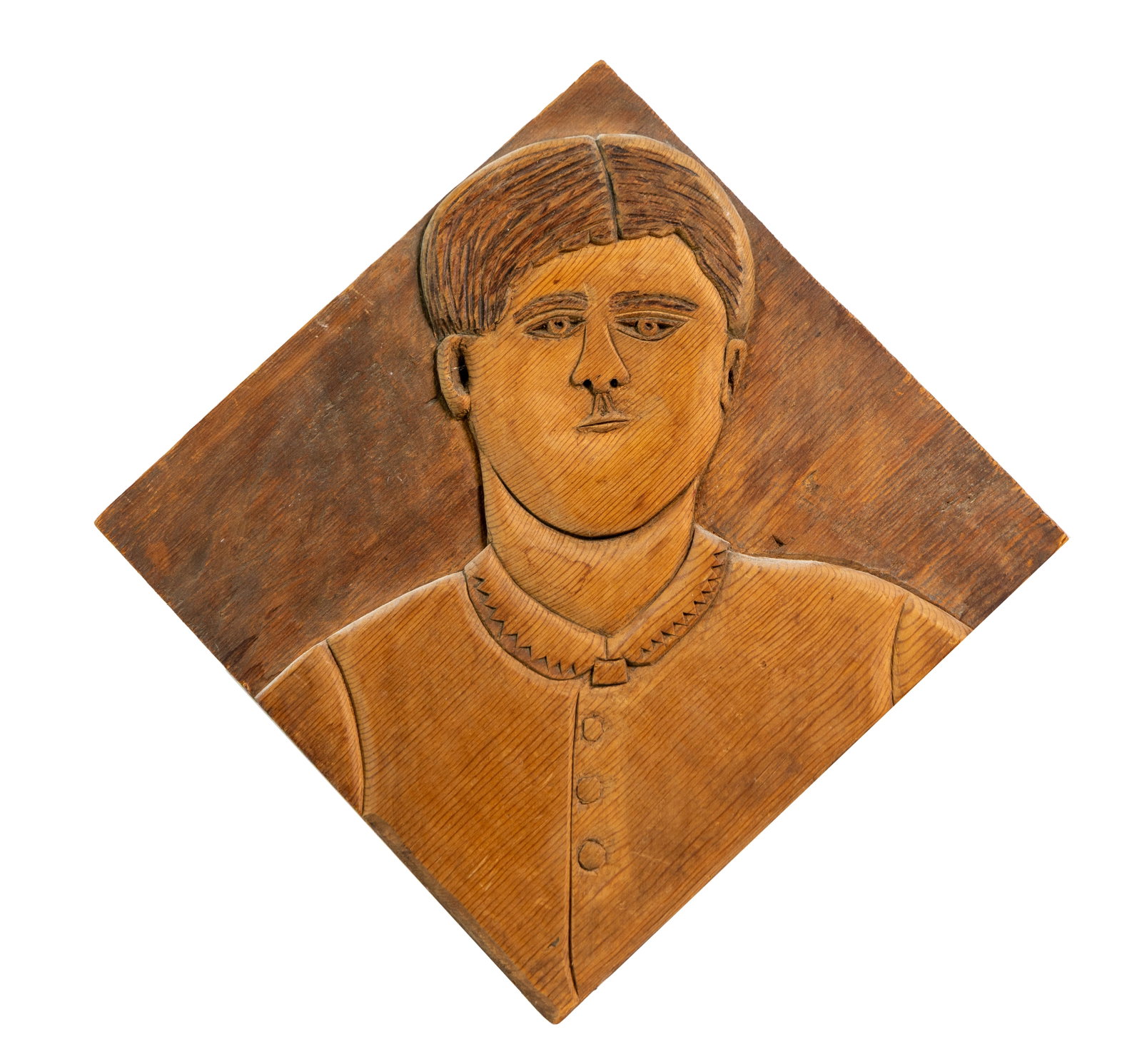 Hand-Carved Folk Art Portrait Plaque with Geometric Hair and Collar: A carved wooden folk-art portrait featuring a stylized figure with geometric hair, incised facial details, and a patterned collar. Warm patina and tool mark texture give the piece strong sculptural pr