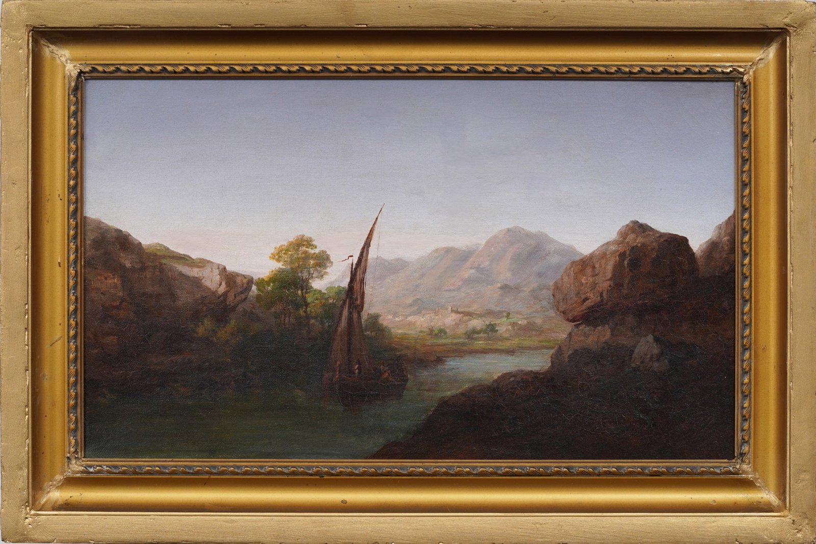 Antique Orientalist River Valley Framed Landscape Sailboat Original Oil Painting: Framed antique European oil painting on canvas. Measuring: 14 by 21 inches overall, and 11 by 18 painting alone. Please see all images for condition. Size is measured and written on the back of the pa