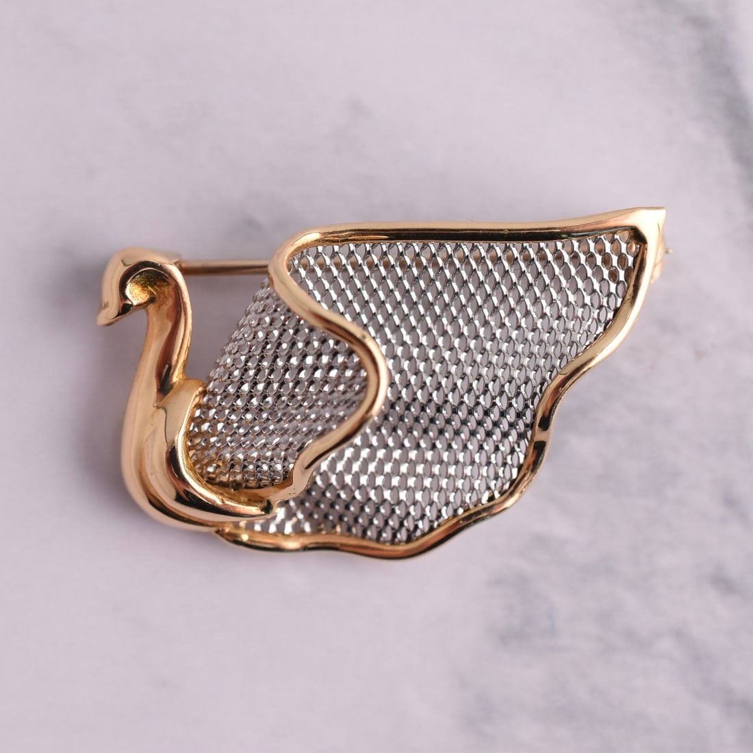 18k Yellow Gold & Platinum Italian Swan Brooch: 18k Yellow Gold & Platinum | Approximate Weight: 3.6g | 1 1/4" wide x 3/4" tall | Piece is marked "18k" and "950PT". Domestic flat rate shipping with Fedex is set to $45 plus insurance for this lot.