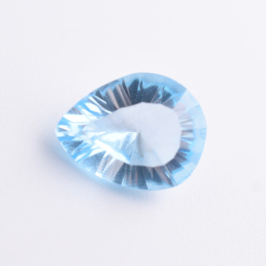 8.5ct Natural Blue Topaz Pear: Size: 12 x 15mm Domestic flat rate shipping with Fedex is set to $45 plus insurance for this lot. Metals and stones are guaranteed. Please see all images for condition For detailed condition questions