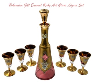 A Vintage Bohemian Gilt Enameled Ruby Art Glass Liquor Set