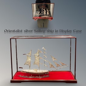 An Orientalist Silver Sailing Ship In A Display Case