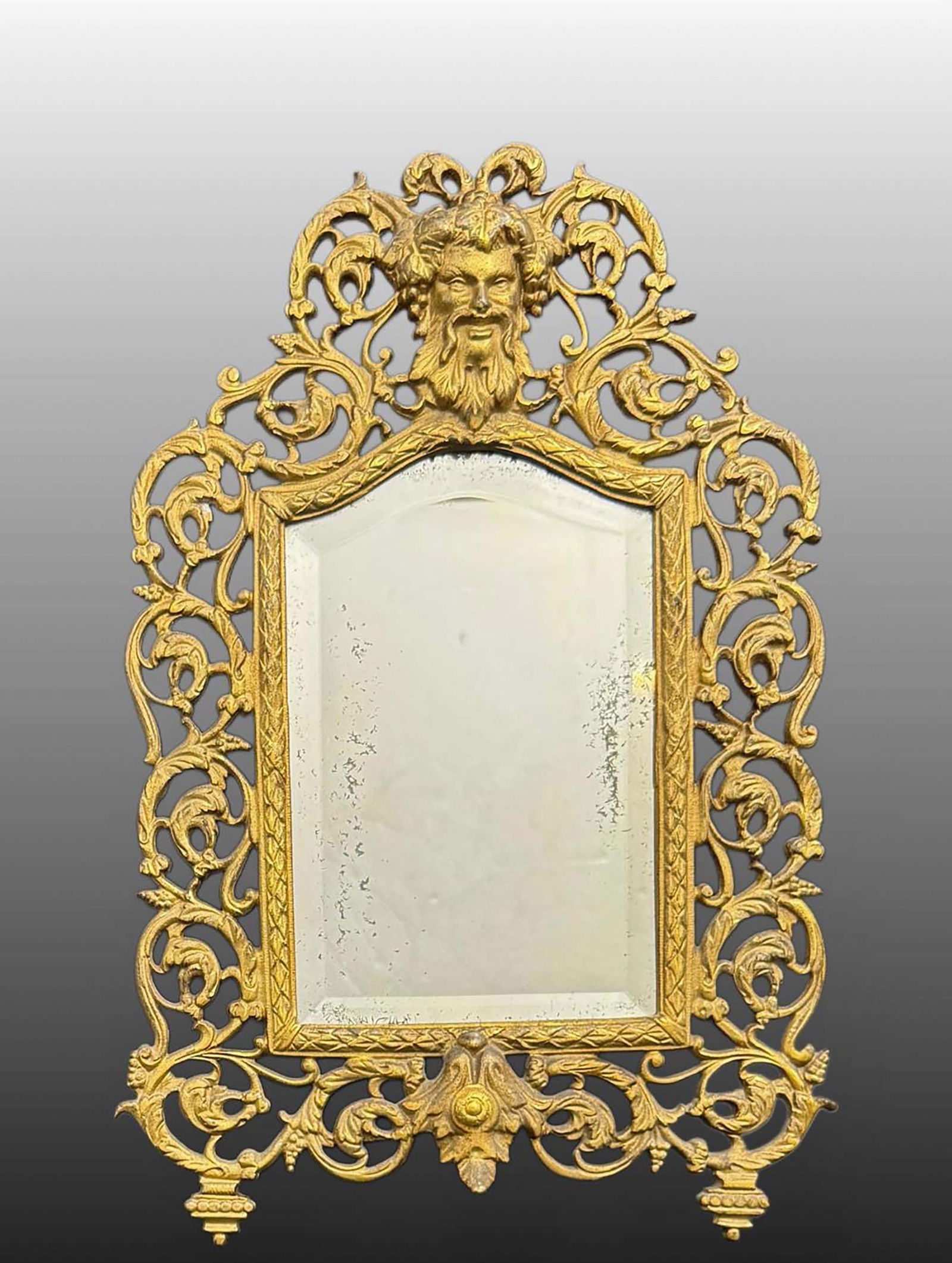 A French Figural Gilt Bronze Framed Mirror: A French Figural Gilt Bronze Framed Mirror. H 15" x L 10"