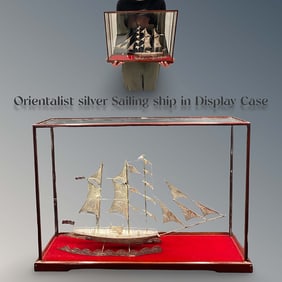 An Orientalist Silver Sailing Ship In A Display Case