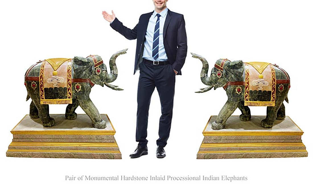 A Pair of Monumental Hardstone Inlaid Processional Indian Elephant Sculptures: A Pair of Monumental Hardstone Inlaid Processional Indian Elephant Sculptures. H 41" x L 45.25" x W 21"
