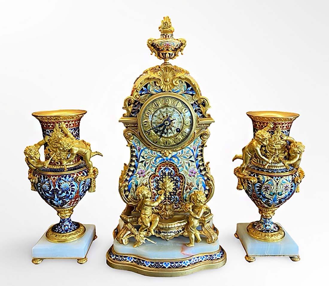 19th C. French Champleve Enamel Figural Bronze Clock Set, Signed: 19th C. French Champleve Enamel Figural Ormolu Clock Set Signed By Adolph Nevir & Kol Hoflieferant. Clock: H 17.6" x L 9" x W 6"; Vase: H 11" x L 5.75" x W 4"