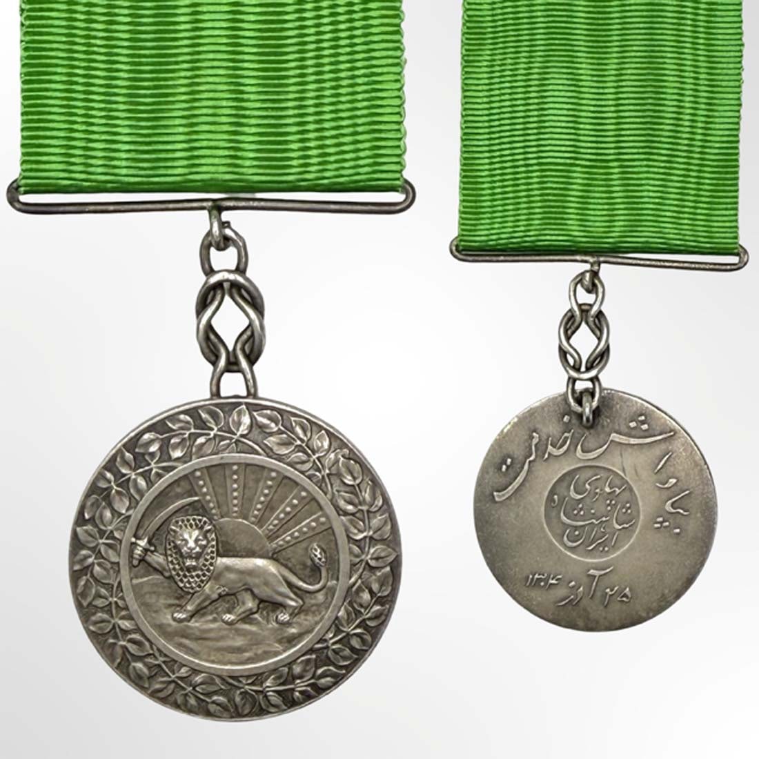 A Rare Persian Pahlavi 1925 Meritorious Service Honor Authentic Silver Medal: ?IRAN: Silver Medal of the Order of Homayoun for Meritorious Service from the Pahlavi Dynasty, circa 1925 by Arthus Bertrand Paris. Full Length 4.25" x Diameter 1.4" (35 mm). Description: Rare and Aut