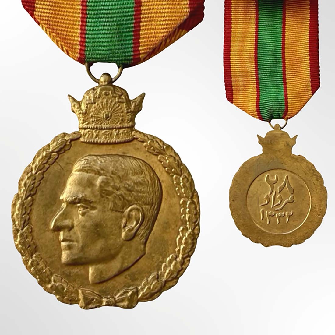 A Persian Pahlavi King Mohammad Reza Shah Military National Uprising Medal, 1953: Iran King Mohammad Reza Shah Pahlavi Military National Uprising Medal, circa 1953. Full Length 4.25", Diameter 1.8" (43 mm). Description: Rare Iranian National Uprising Medal of 1953 (28th Mordad),