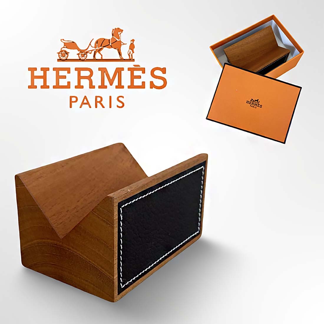 A Hermes Natural Mahogany Saddle-Stitched Leather Business Card Holder: A French Hermes Business Card Holder in Solid Natural Mahogany and Smooth Saddle-Stitched Leather in original box. H 2" x L 3.6" x W 2.3"