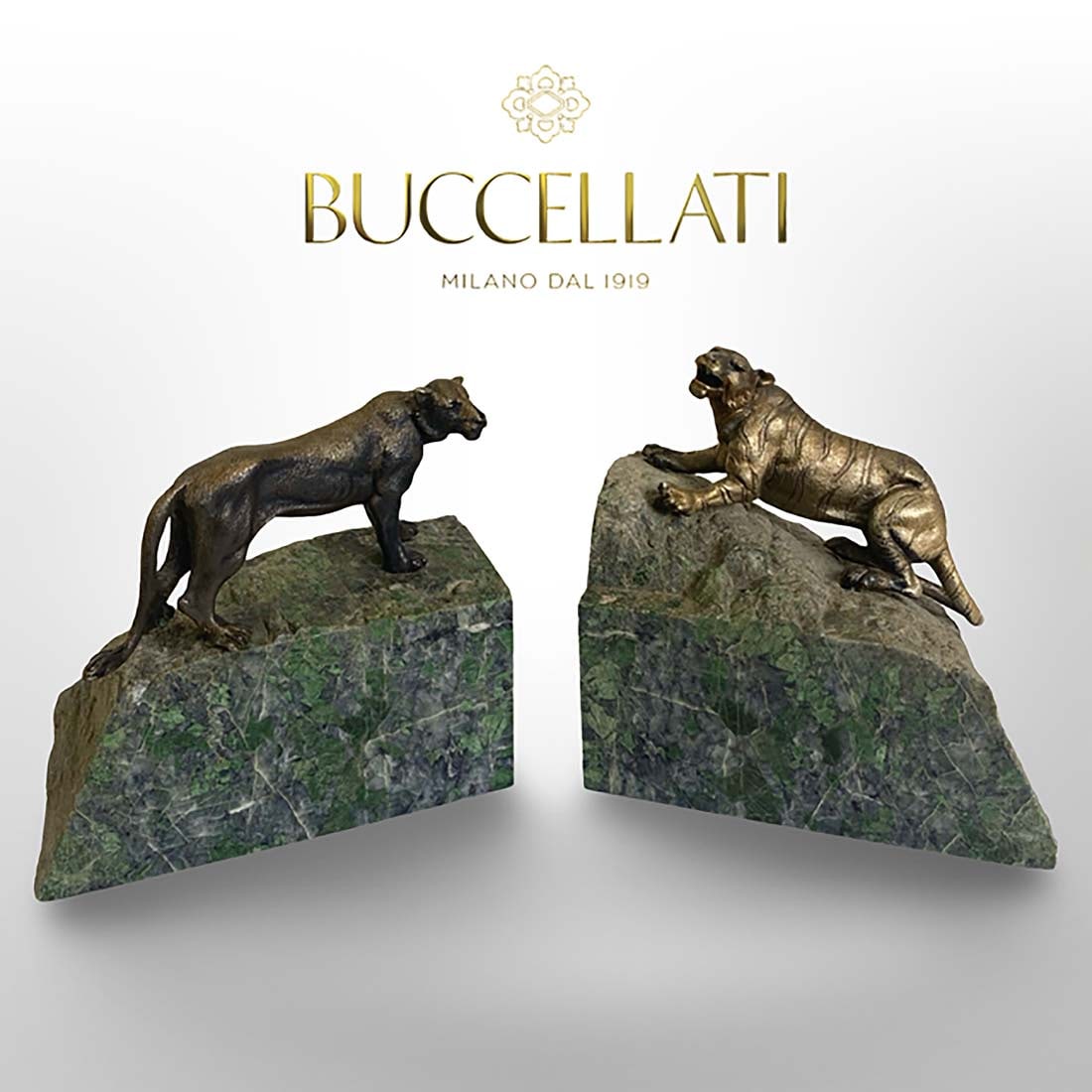 A Pair of Buccellati Sterling Silver Lion Sculpture on Marble Stones, Signed: A Pair of Italian Buccellati Sterling Silver Lion Statues Mounted on Marble Stones, Signed. Measurements: H 5" x L 5" x W 3.25"; H 4.5" x L 5.25" x W 3.25"