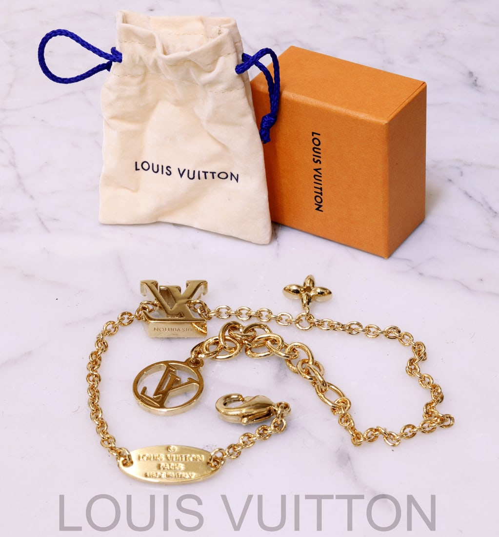 A LOUIS VUITTON Jeweled LV Logo Pendant Necklace (1 of 2)