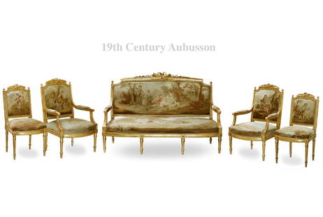 19th Century French Parcel Gilt Carved Aubusson Tapestry parlor Salon Set: 19th Century French Parcel Gilt Carved Aubusson Tapestry parlor Salon Set. Sofa size: H 42.5" x 64" x 27". Handled Chairs: H 40" x 24" x 22". Chairs: H 37" x 20" x 18"