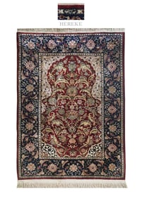 A Fine Turkish Hereke Silk Rug, Signed
