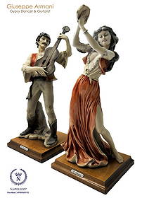 A Rare Pair Of Capodimonte Giuseppe Armani Gypsy Tambourine Dancer & Guitarist Figurines: A Rare Pair Of Italian Florence Capodimonte Giuseppe Armani's Gypsy Dancer & Guitarist Matt Hand Painted Porcelain Statues on Wooden bases. Signed by artist, 1983 dated, Capodimonte Hallmarked. Dancer