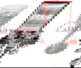 A Cartier Full Set Of Crystal & Sterling Silver Cordial Glasses, Hallmarked, Boxed: A Cartier Full Set Of Crystal & Sterling Silver Cordial Glasses with Original Box, Signed. Each glass" 4" H x 2" x2", Box size: 12" x 11" x 4" H