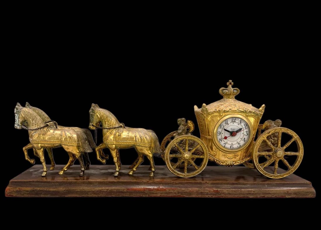 A Vintage Metallic Figurine Group of Royal 4 Horse-Drawn Carriage Mantle Clock: A Vintage Figurine Group of Royal Four Horse-Drawn Carriage Mantle Electric Clock on Wooden Base. L 21"