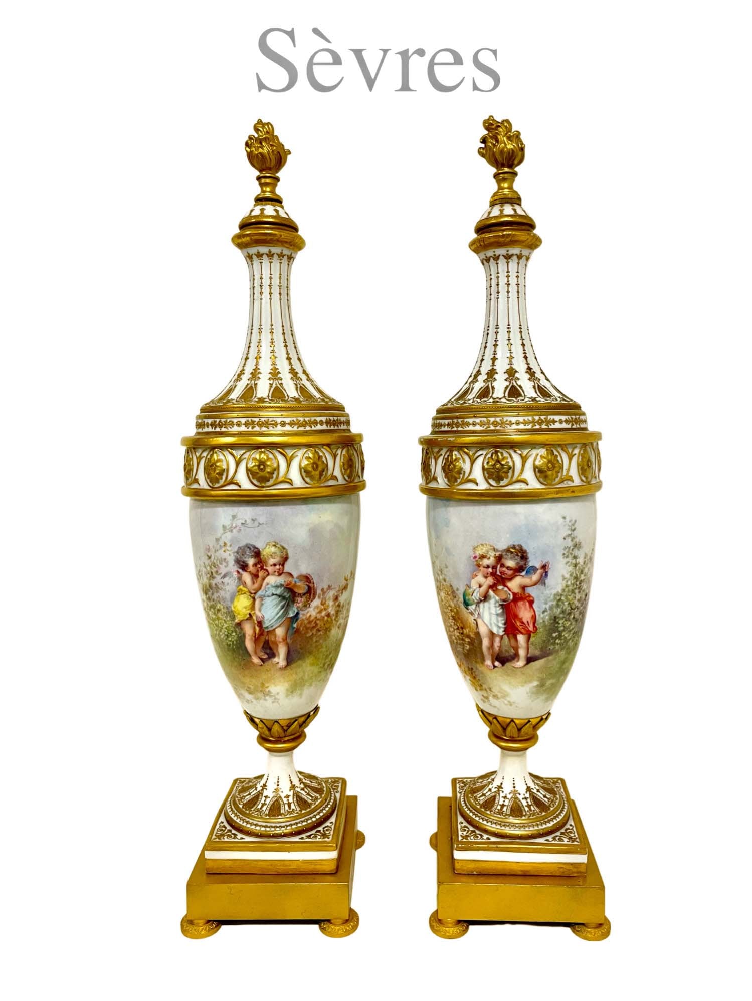 A Pair Of 19th C. French Sevres Hand Painted Porcelain Bronze Lidded Vases: A Pair Of 19th C. French Sevres Hand Painted Porcelain Bronze Lidded Vases. H 18.5" x 5"