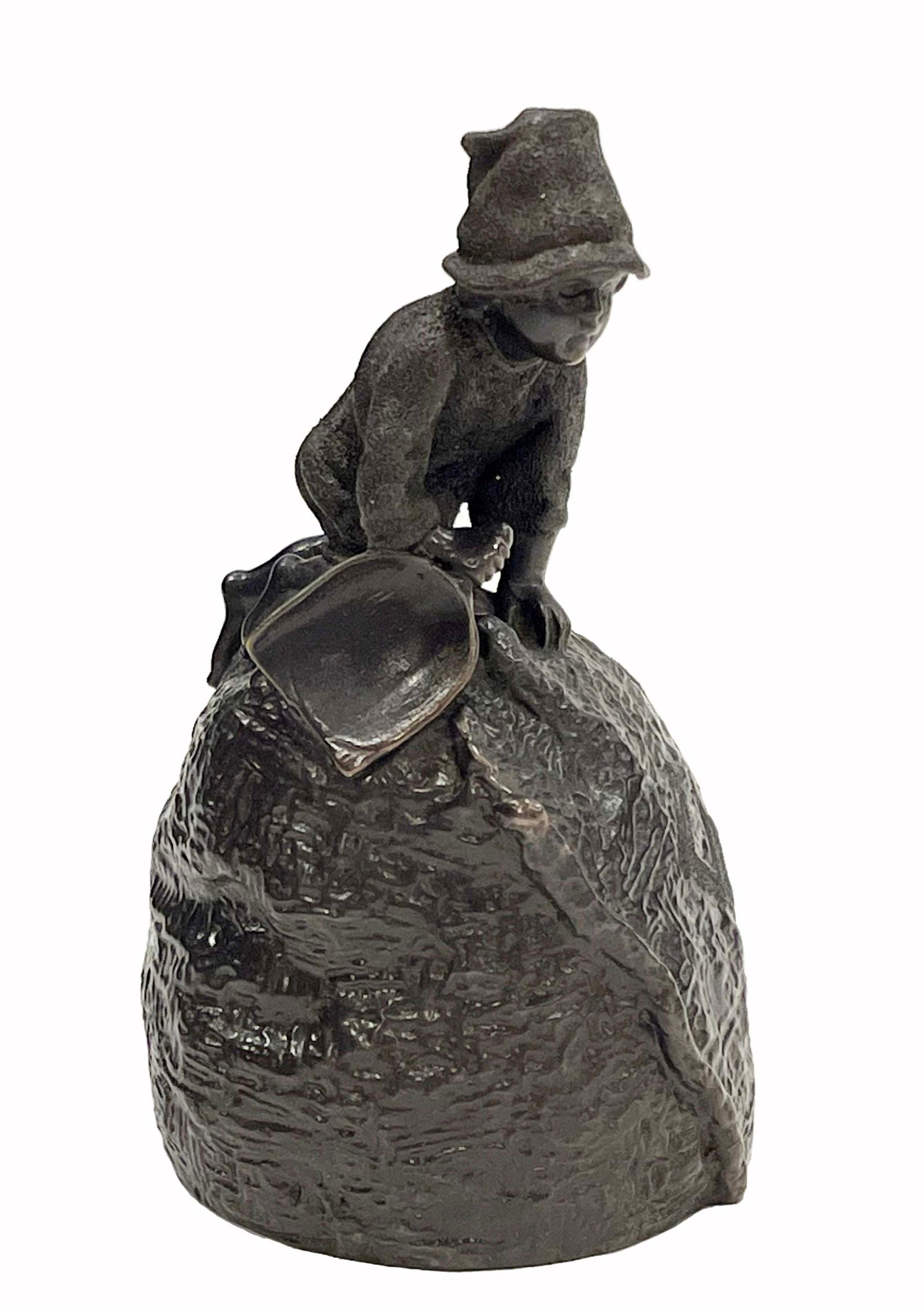 A Russian Bronze sculpted Table Bell, Signed: A Russian Bronze sculpted Table Bell, Signed E. A. Lanceray (1848-1886). H 4" x D 2.5"