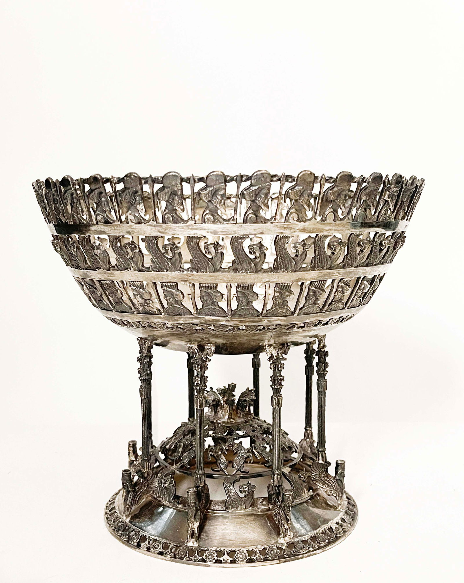 A Persian Empire Achaemenid Style Figural Silver Centerpiece: A Persian Empire Achaemenid Style Figural Silver Centerpiece. 9" H x 9.5" D. Weight: 1728 Grams.