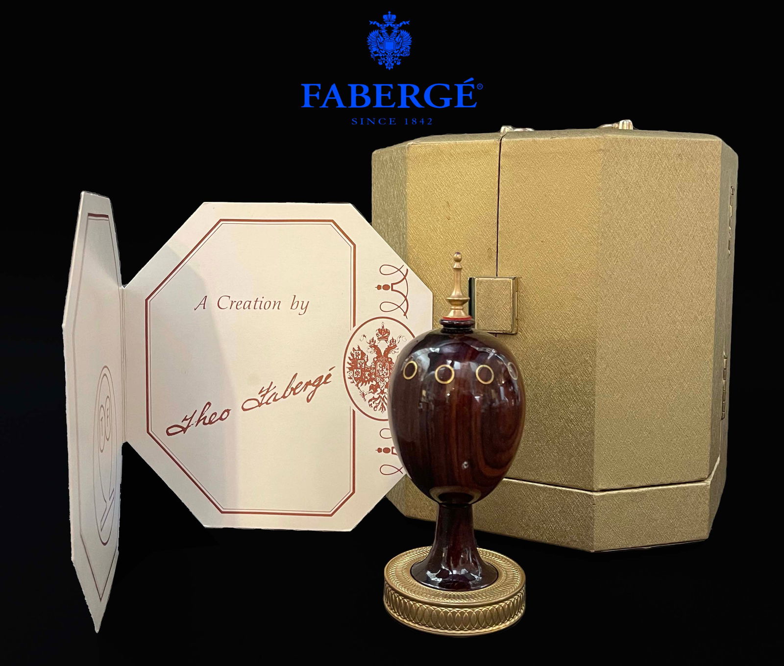 A Limited Edition Theo Faberge Signed Boxed Cocobolo Wood Scribe Egg, COA: A Limited Edition Theo Faberge Signed Cocobolo Wood Scribe Egg, Numbered: 152, Box & COA. 2.5" x 5" H