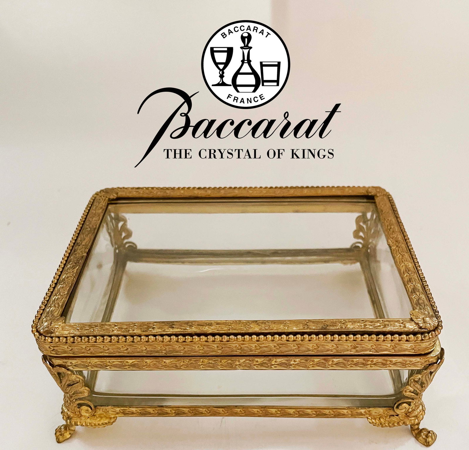 A Baccarat Crystal Bronze Jewelry Box: A Baccarat Crystal Bronze Jewelry Box. 6.5" x 5" x 2.5"