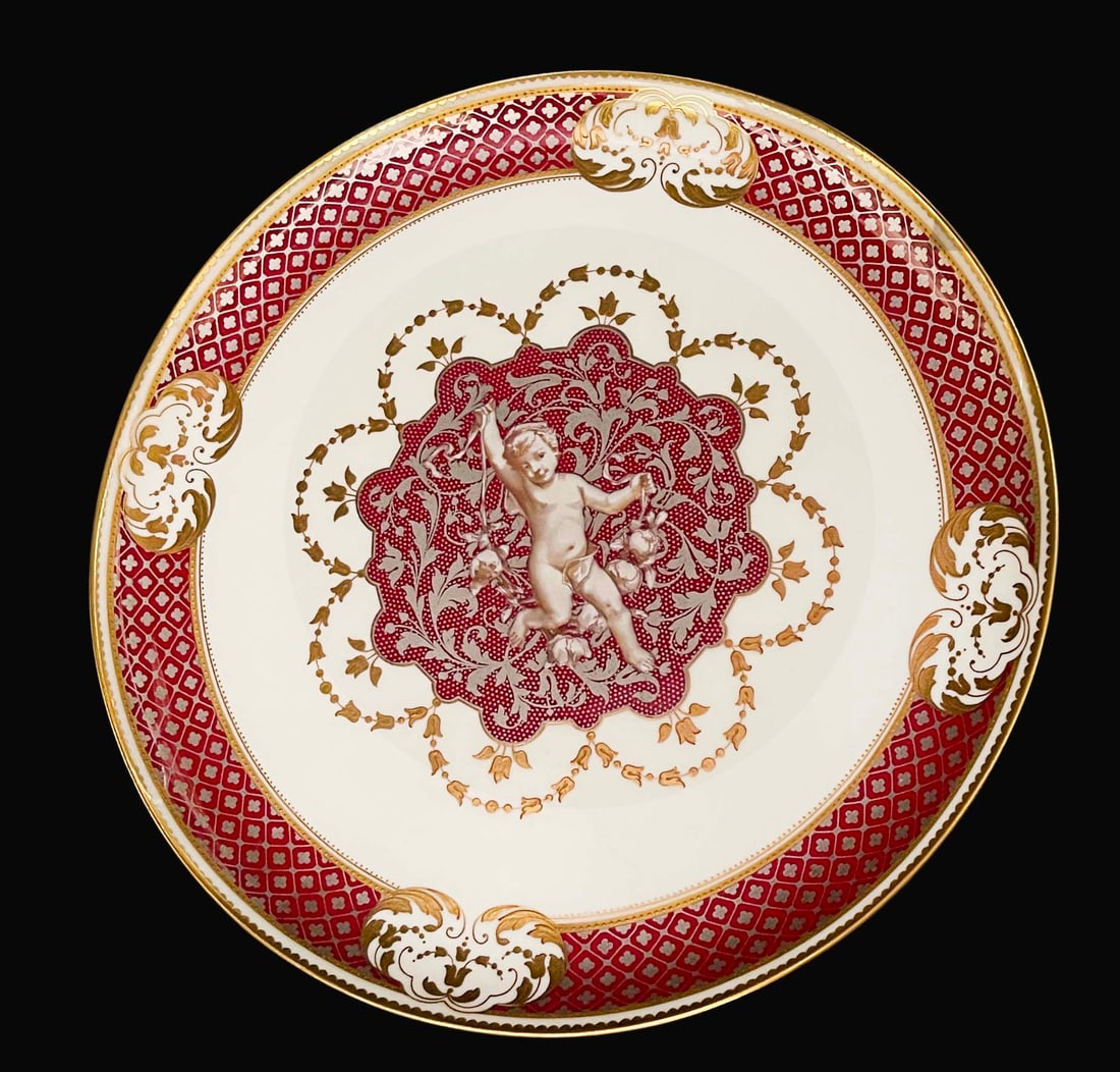 19th C. French Hand Painted Porcelain Decorative Wall Plate: 19th C. French Hand Painted Porcelain Decorative Wall Plate. The subject is a hand-painted cherub (cupid) with fine enameling. D 9.25". Condition: Excellent.