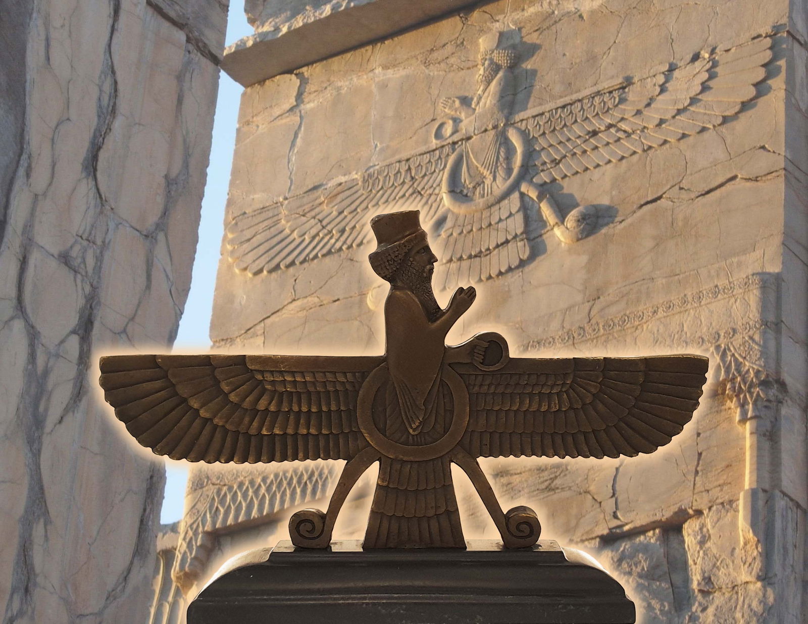 A Persian Faravahar Religious Symbol Figural Bronze Statue, Signed: A Persian (Iranian) Faravahar Religious Symbol Figural Bronze Sculpture on marble base. Signed by Kanaev (Russian artist). H 8" x 11" x 2.5". About Faravahar: The Faravahar, also known as the Forouhar