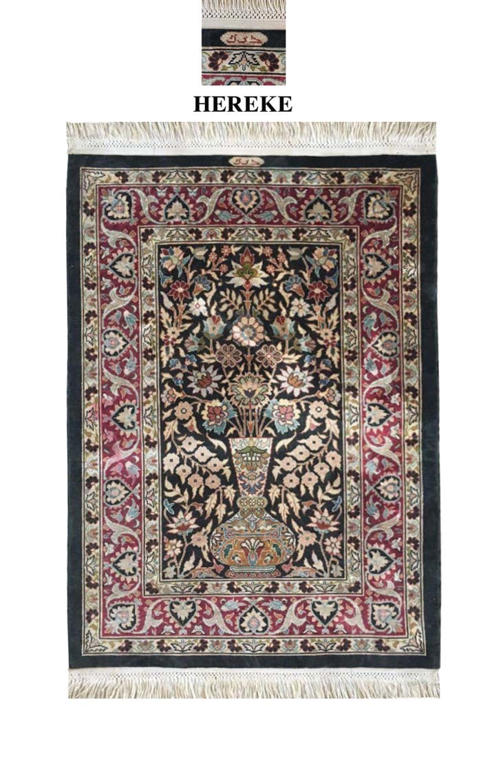 A Fine Turkish Hereke Silk Rug, Signed: Handwoven 100 percent pure silk rug. Signed by master weaver. Handmade in the city of Hereke, Turkey. 29" x 19.5"