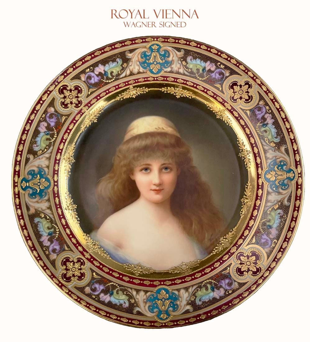 A Royal Vienna Hand Painted Of A Lady Bust Porcelain Decorative Wall Round Plate, Wagner Signed: An Austrian Royal Vienna Hand Painting of a bust, Signed by Wagner Fine Enameling on Border, Stamped under glazed beehive marks. Condition: Excellent. D 9.5"