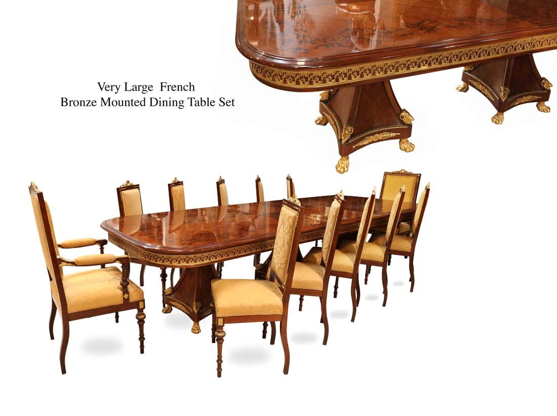 A Very Large 19th C. French Bronze Mounted Dining Table Set: A Very Large 19th Century French Bronze Mounted Dining Table Set. An adjustable Size table with 10 chairs plus 2 armchairs (12 chairs). Table total size: H 31.5" x 52" x 151"