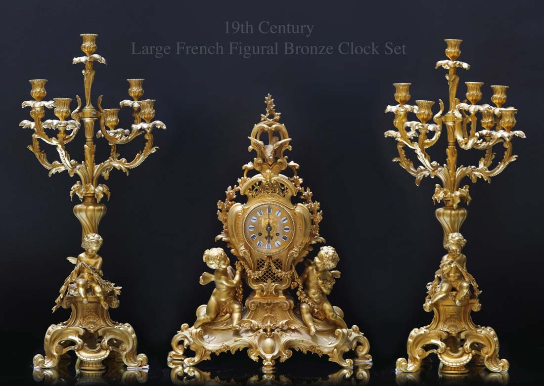 A Fine Large 19th C. French Figural Bronze Clock Set: A Fine Large 19th C. French Figural Bronze Clock Set. Clock: H 25.5" x Candelabras: H 31"