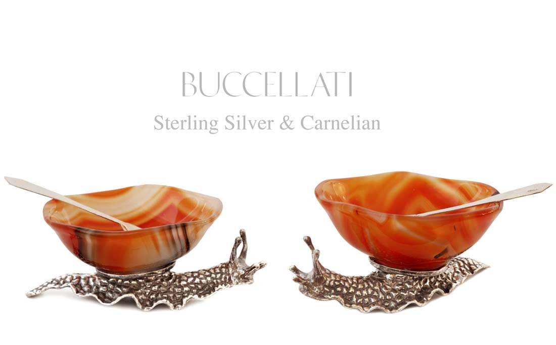 A Pair of Buccellati Sterling Silver & Carnelian Salt/Pepper Shakers: A Pair of Italian Buccellati Sterling Silver & Carnelian Salt/Pepper Shakers, Hallmarked. 2.5" x 3.5" x H 1.5"