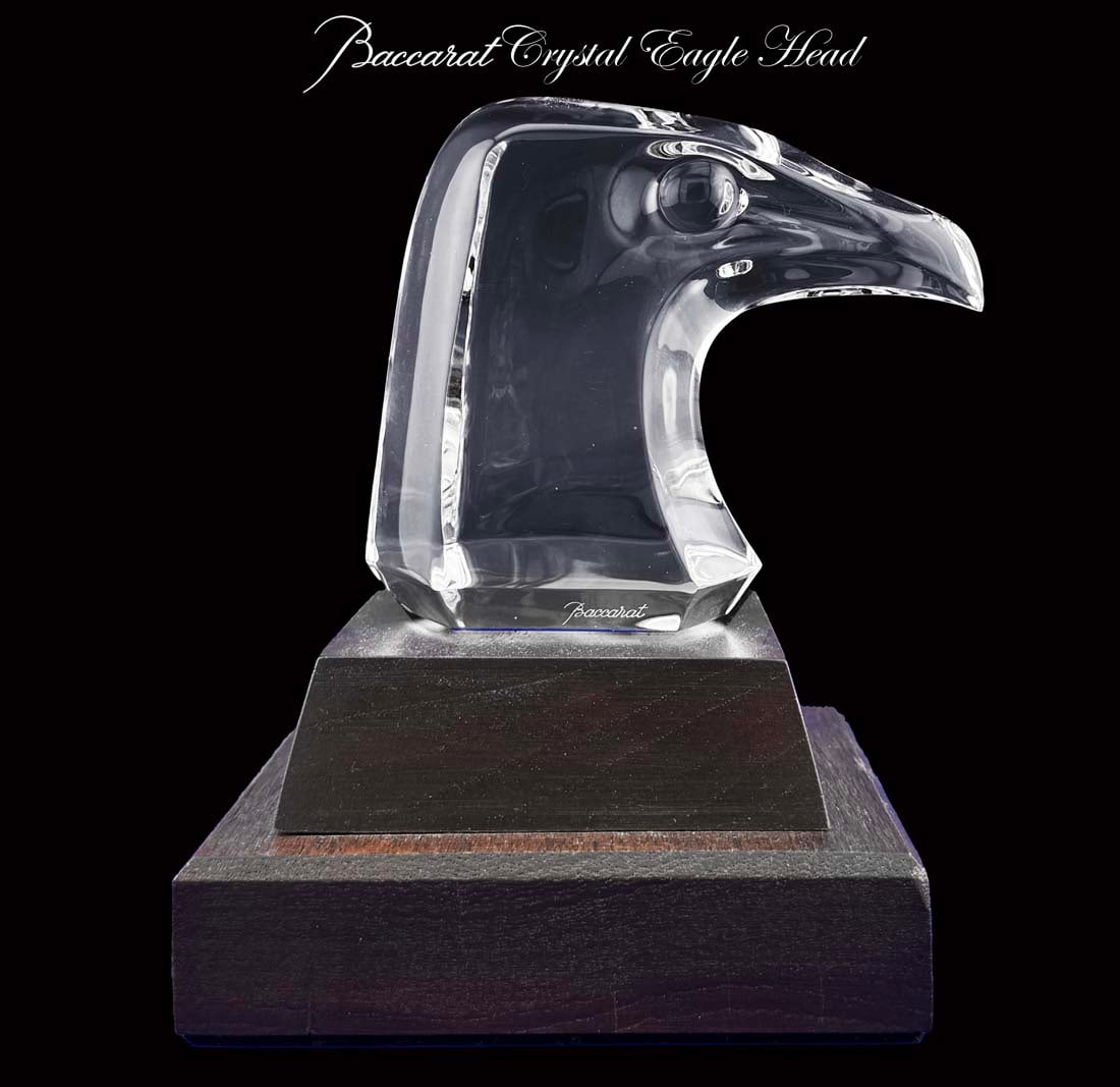 A Vintage BACCARAT Clear Crystal Eagle Head Sculpture on Wooden Base, Signed: A French BACCARAT Clear Crystal Eagle Head Statue on A Wooden Base, Signed. the Crystal size: H 3.5" x 4.5" x 2.25". Note: The eagle head & the base are separated. the Base size: H 2.1" x 4.5" x 4.5"