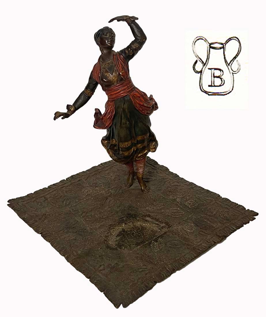 The Orientalist Dancer, F. Bergman Patinated Bronze Figurine, Hallmarked: The Orientalist Dancer On Rug, F. Bergman Patinated Bronze Figurine, Bergmann Hallmarked. 7" H x 6.25" x 6.25". About Artist: Franz Xaver Bergmann (or Franz Xaver Bergman) (July 27th 1861-1936) was th