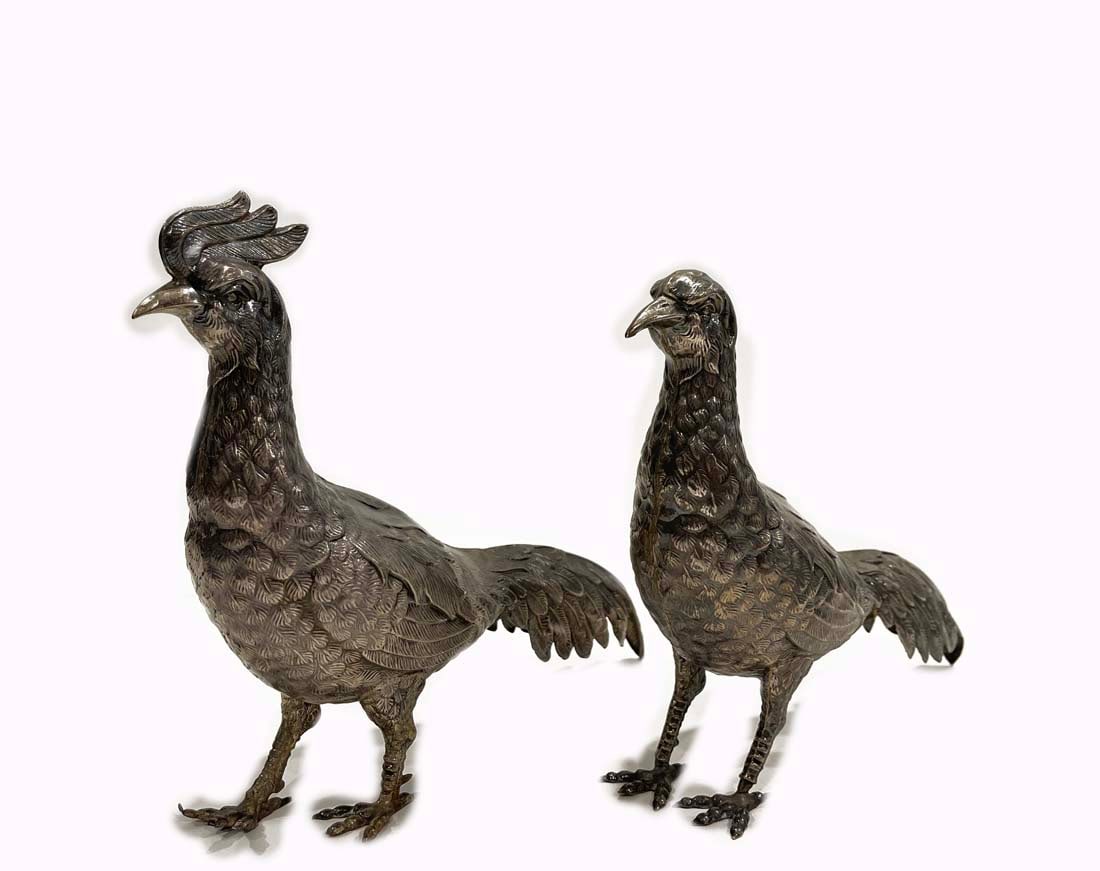A Pair Of Pheasant Silver Figurines: A Pair Of Male & Female Pheasant Silver Figurines. Female: 10.5" x 2.5" x 7.5" H, Male: 10.5" x 2.5" x 8" H. Total Weight 461 Grams