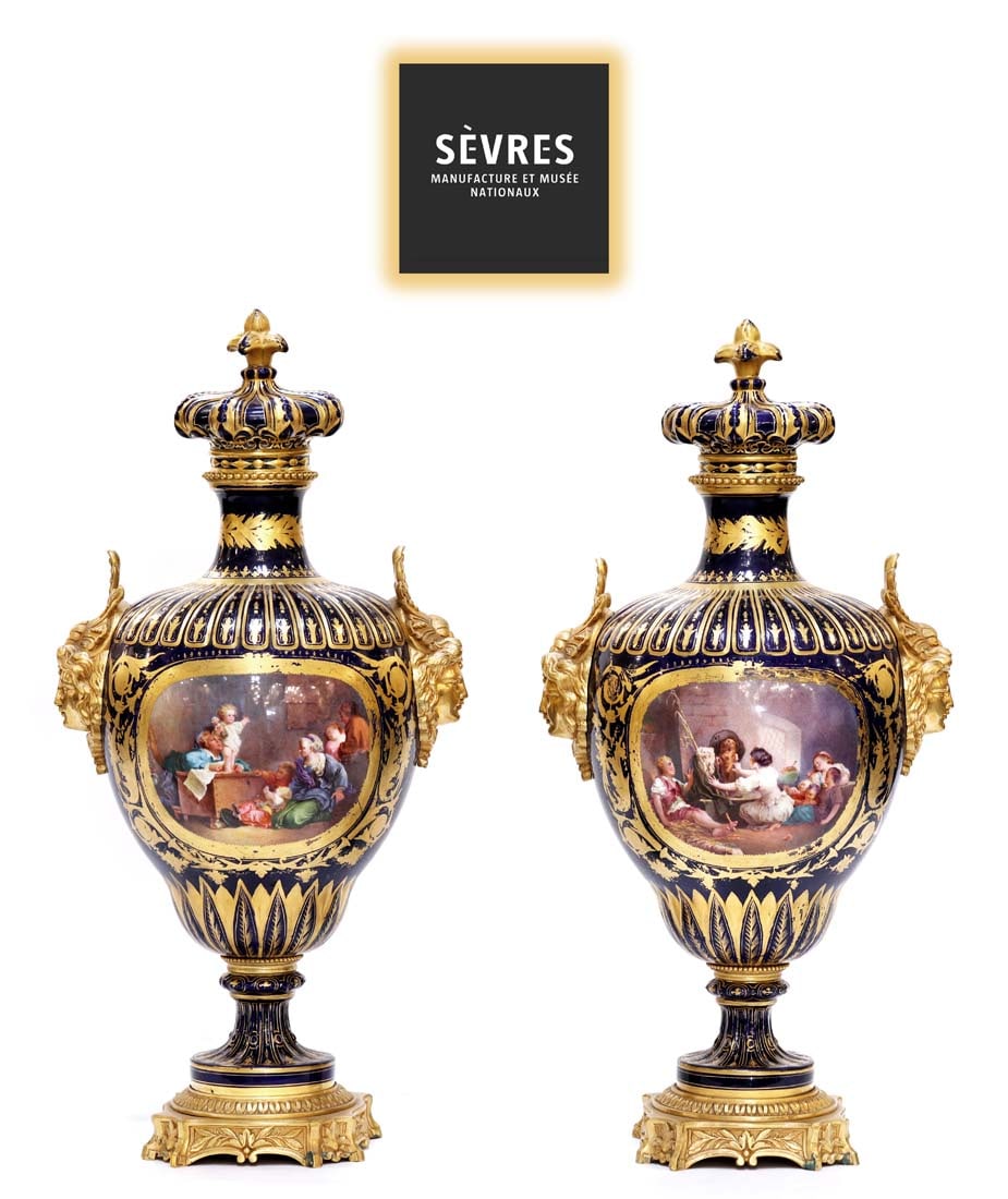 A Pair Of 19th Century Sevres Porcelain Bronze Figural Urns: A Pair Of 19th Century French Sevres Hand Painted Porcelain Bronze Figural Urns. H 21" x W 10"