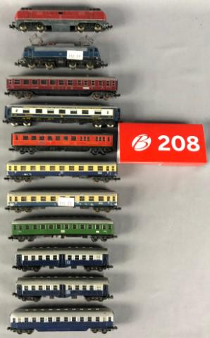 N-Scale 9 Passenger Cars and 2 Powered Locomotives: N-Scale 9 Passenger Cars and 2 Powered Locomotives * Arnold Rapido Made In West Germany Passenger Cars (Qty: 5) * West Germany Trix Passenger Cars (Qty: 3) * Lima Italy Passenger Car (Qty: 1) * West G