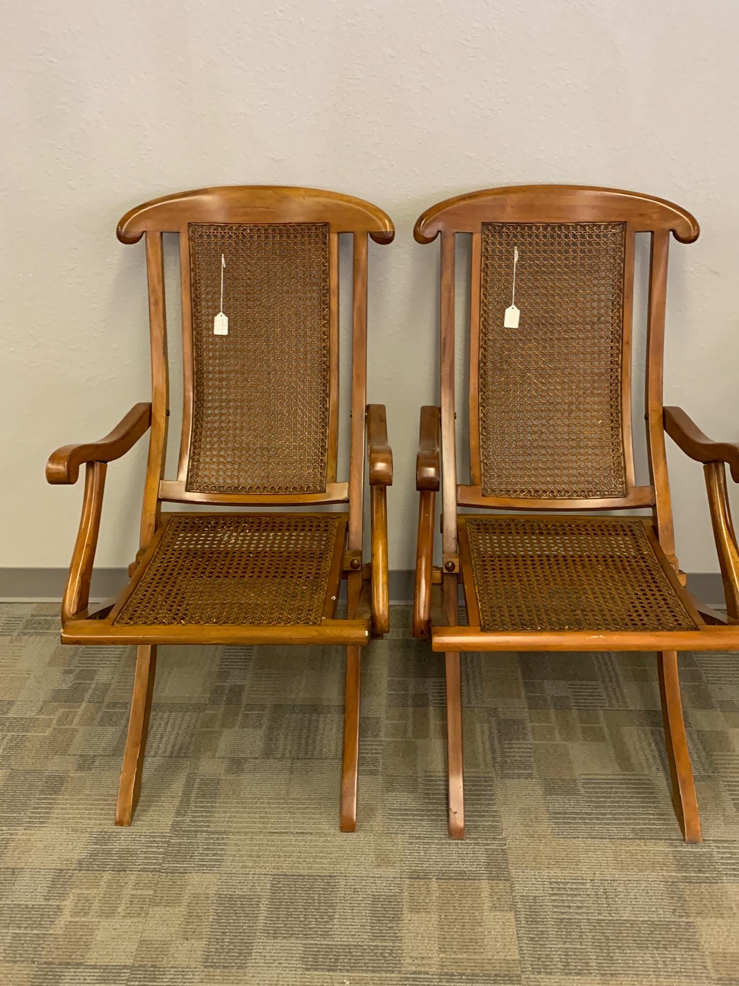 Two Caned Folding Deck Chairs: Material: WoodColor: Brown