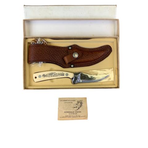 Schrade Scrimshaw Knife: New in box. Box is worn.